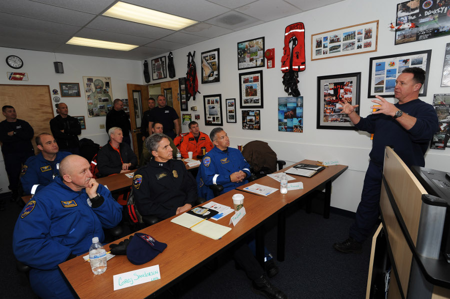 120127-G-LS819-003-AHRS-s U.S. Coast Guard Senior Chief Petty Officer Thomas Beaudry (right), lead instructor of the Advanced Helicopter Rescue School (AHRS) in Astoria, Ore