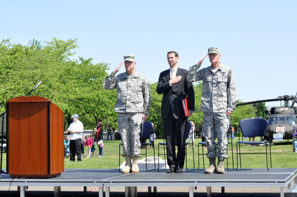 Oregon's Adjutant General, Maj. Gen. Raymond F. Rees (left); Mr. John Kroger (center), State Attorney General, and Brig. Gen. Steven Gregg, Commander of the Oregon Air National Guard, salute during the playing of the National Anthem at the Armed Forces Day ceremony Oregon's Adjutant General, Maj. Gen. Raymond F. Rees (left); Mr. John Kroger (center), State Attorney General, and Brig. Gen. Steven Gregg, Commander of the Oregon Air National Guard, salute during the playing of the National Anthem at the Armed Forces Day ceremony, May 17, at the State Capitol Mall in Salem, Ore. (Photo by Staff Sgt. April Davis, Oregon Military Department Public Affairs Office)