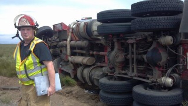 Overturned semi truck and trailer