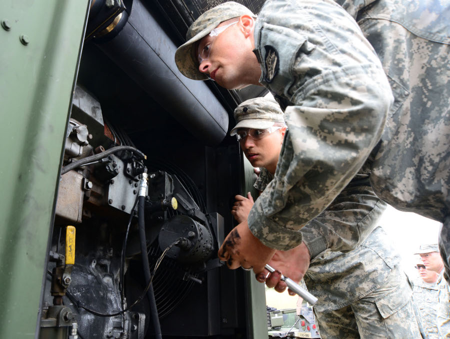 Spc. Corey Buoy and Spc. Franklin Dominguez, with the 3670th Maintenance Company ground support platoon Spc. Corey Buoy and Spc. Franklin Dominguez, with the 3670th Maintenance Company ground support platoon