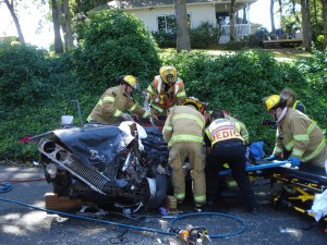 Jefferson and Albany crews working to get the patient out of the vehicle. Jefferson and Albany crews working to get the patient out of the vehicle.