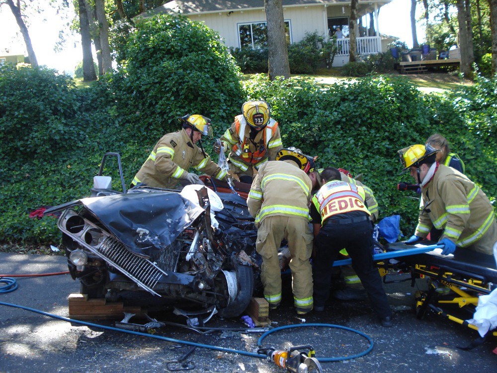 Jefferson and Albany crews working to get the patient out of the vehicle.