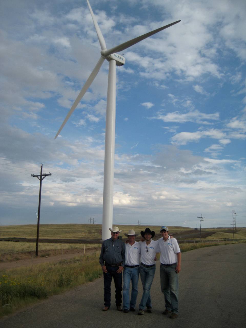 Nate Sandvig (2nd from left) and his project team at a windfarm site. Courtesy of Sandvig.