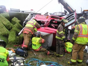 Crash scene 2005 Freightliner truck pulling two trailers loaded with hay 2 Crash scene 2005 Freightliner truck pulling two trailers loaded with hay 2