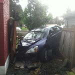 Car crashes into Aloha homes